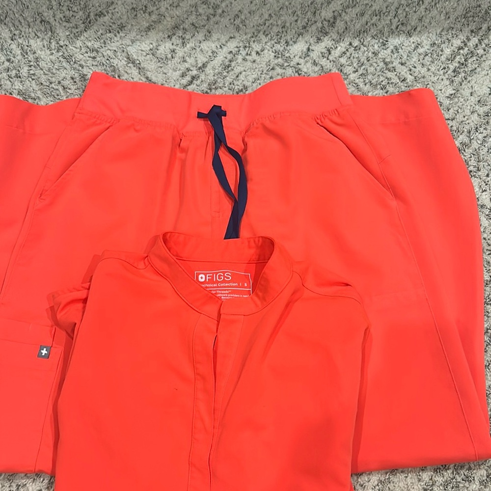 FIGS FIERY ORANGE WIDE LEG PANTS AND OVER SIZED SHIRT.